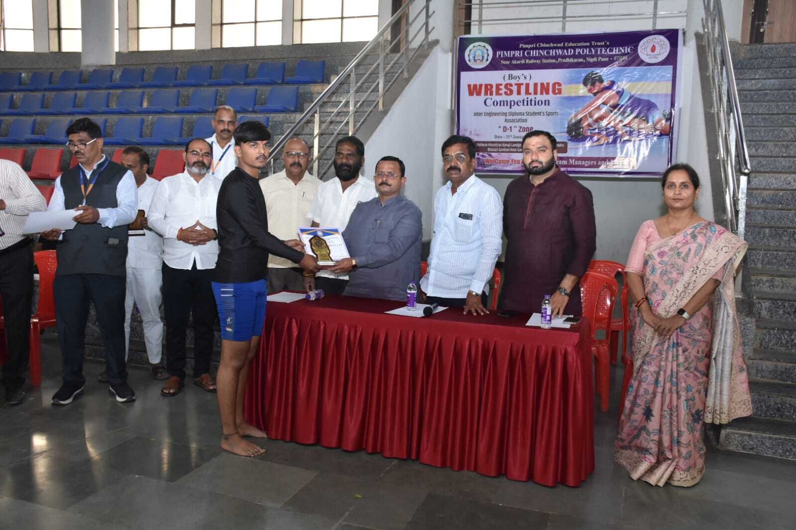 TYME student Kiran Kolpe securing Winner prize in 70 KG Wrestling at Zonal match of IEDSSA  at Bhosari,Pune